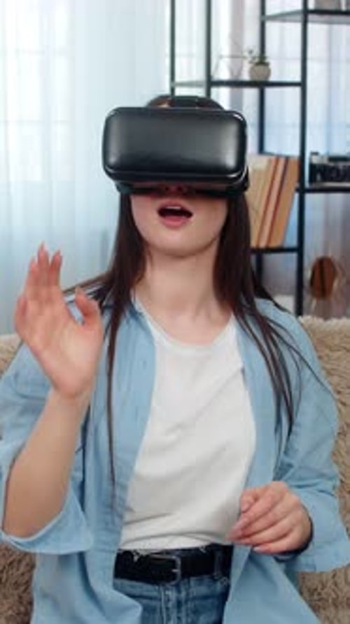 Young Woman Experiencing Virtual Reality at Home