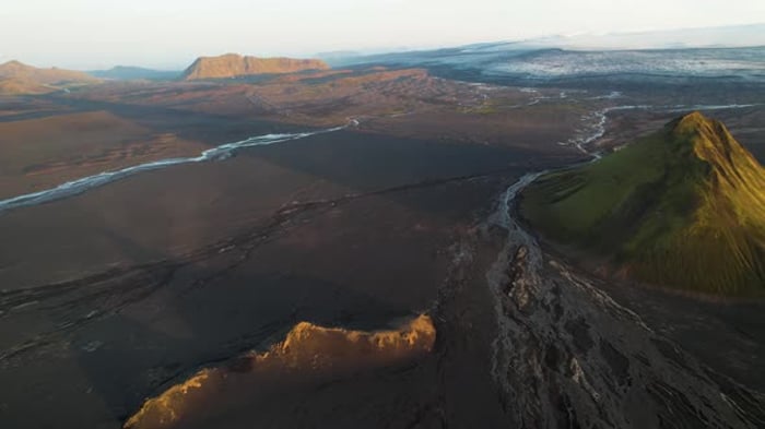 Aerial View Of Maelifell Volcano And Icelandic Landscape At Sunset aerial-view-of-maelifell-volcano-and-icelandic-landscape-at-sunset
