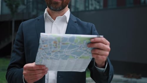 Unknown Man Tourist Traveler Businessman Guide Search Way on Map Search Address Route Destination