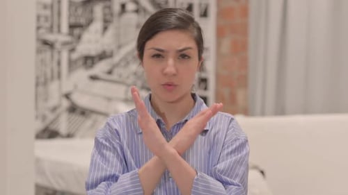 Young Adult Showing No Sign with Arms