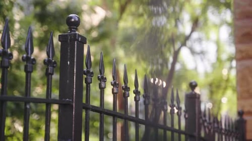 Fence in sun on Chicago Street