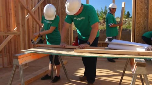 Dedicated volunteers building homes together for habitat for humanity