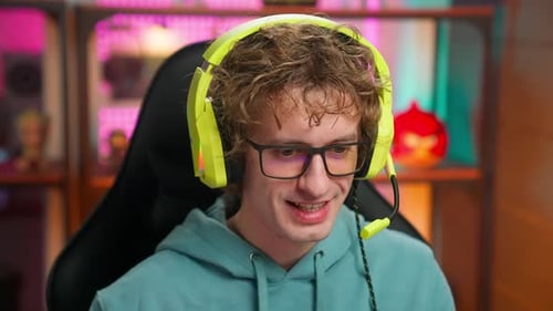 Young Man with Headphones Smiling