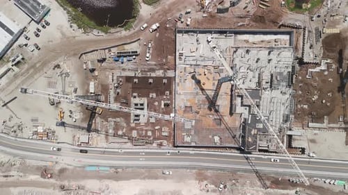 A Construction Development Site in Florida Crane on the Construction Site Aerial Drone View