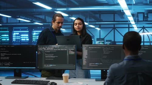 Team Reviewing Code in a Bright Data Center