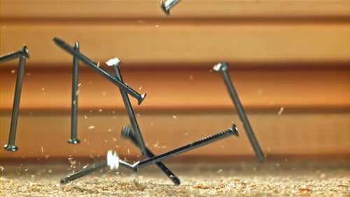 The Nails Fall on the Master's Desk Filmed on a Highspeed Camera at 1000 Fps