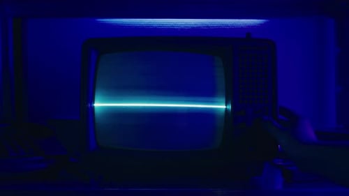 Retro Television Shows Static in Dark Room