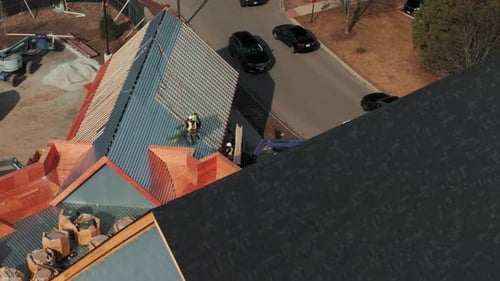 Industrial Roof Installing a New Roof on an Building Drone View Footage