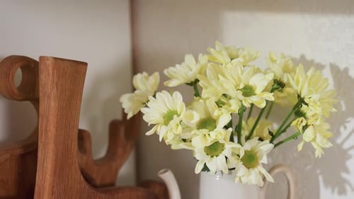 Yellow Daisy Bouquet and Wooden Boards in Bright Kitchen Corner Decor