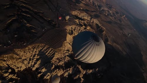 Scenic Hot Air Balloon Flight over Arid Landscape