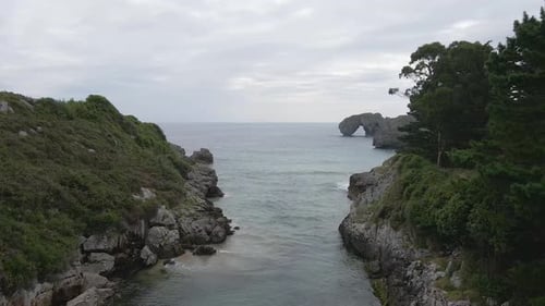 Aerial view of Asturias coastline. Drone shot of sea, cliff, rocks and the Atlantic ocean in Spain.