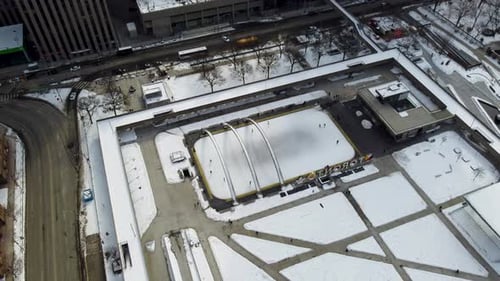 Aerial winter view of the ice skating rink at Nathan Phillips Square 4K