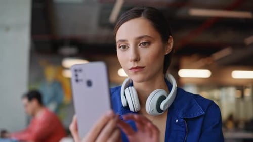 Happy Lady Reading Message Cellphone in Cozy Cafeteria Closeup Smiling Woman