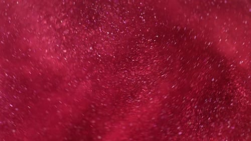 Red Glittering Dust Swirls in Space