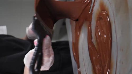 Spreading Melted Chocolate with Spatula for Dessert