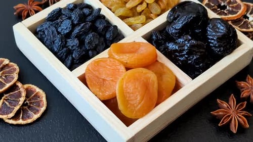 Wooden Tray with Dried Fruit Still Life