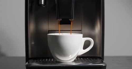 Espresso Machine Brewing Cup of Coffee