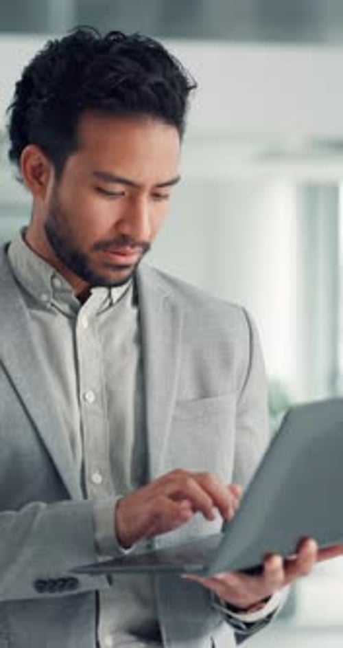 Man, lawyer and laptop for typing at workplace for court prep, evidence search on legal database
