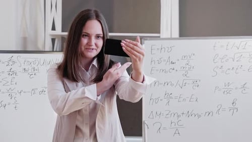 Enthusiastic Female Explains Math Via Video Call