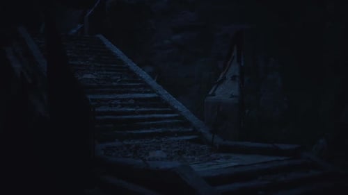 Dark Mysterious Stone Stairs in a Dusty Cave