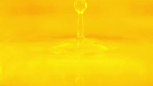 Golden Yellow Liquid Drop Close Up