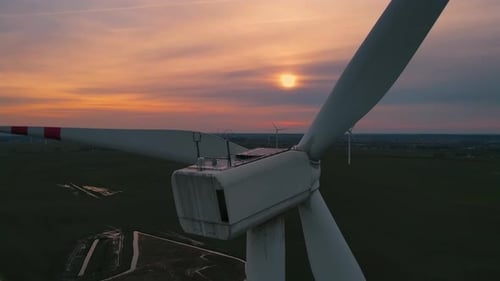 Wind Turbines on Wind Farm Field Generating Clean Renewable Energy for Sustainable Development Close