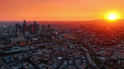 Beautiful warm orange light covering the panorama of Los Angeles, California, USA.