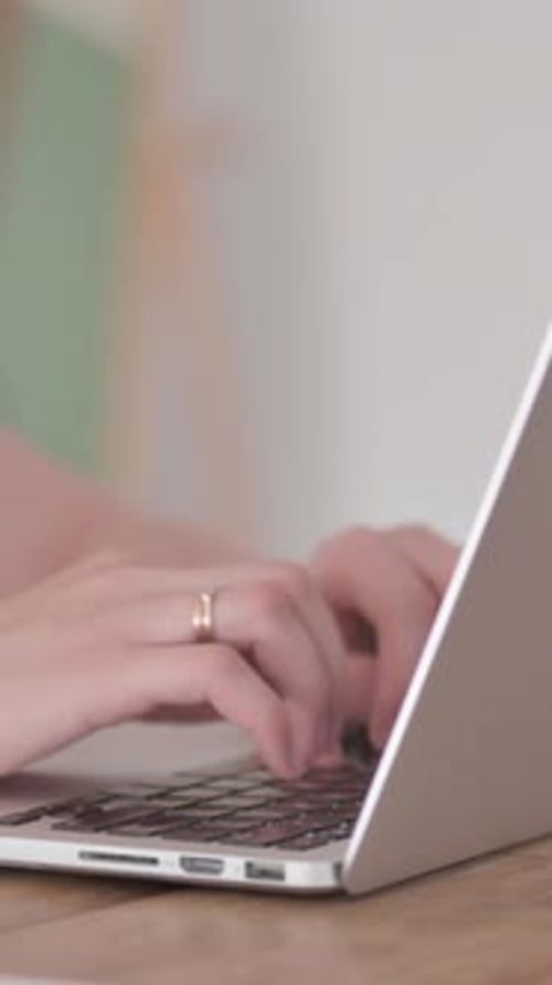 Close Up of Female Hands Typing on Laptop, Vertical Video