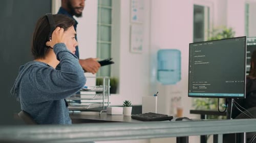 Software Engineer Working on User Interface and Writing Code with Html Script