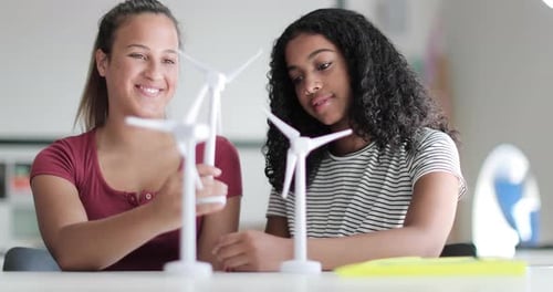 High school students studying renewable energy