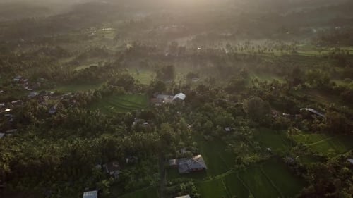 Aerial drone view of the misty landscape at the countryside of Bali, Indonesia.