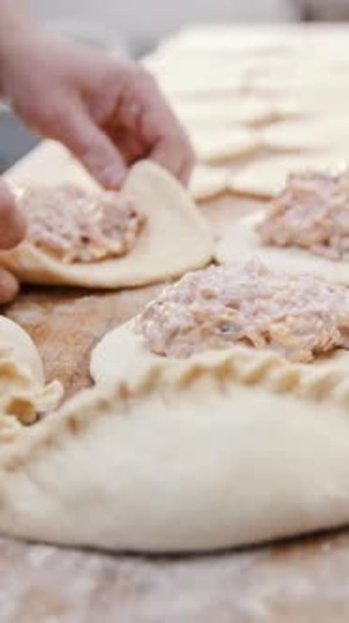 Cooks is Making Meat Pie By Hands