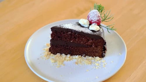 Chocolate Cake Slice on a White Plate