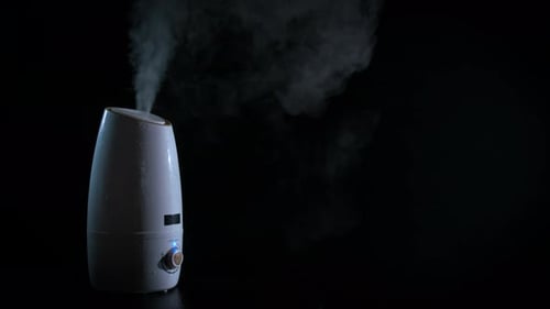 Working Air Purifier with White Steam