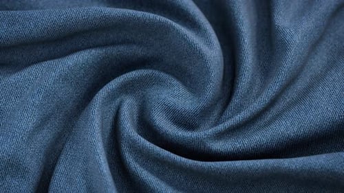 Fluid Swirling Blue Fabric Texture Abstract Background