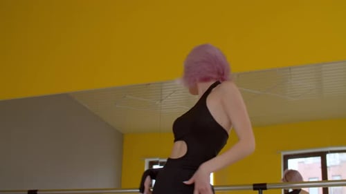 Woman Dancing Expressively in Studio