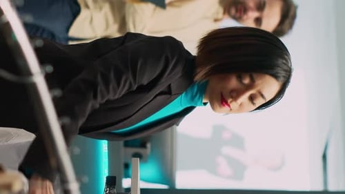 Vertical Video Asian Customer Looking at Formal Wear Shirt in Retail Shop