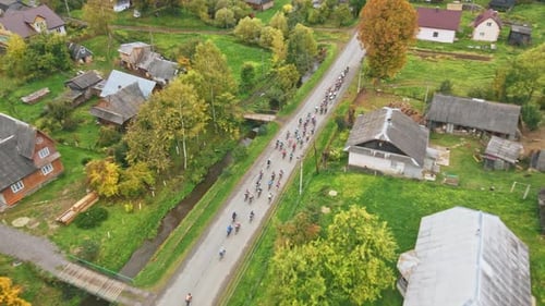 In Village Road Top View of People Riding Bicycles Lots of Participants of Sports Competition