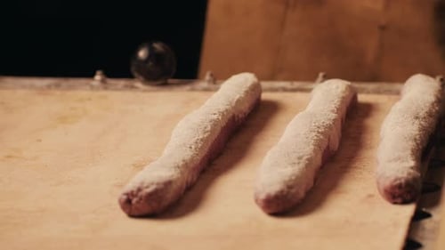 Bakery Chef Making Fresh Artesian Buns and Baguettes Using Traditional Recipe Closeup Young Man