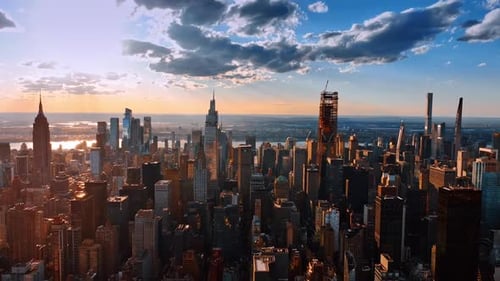 Multiple skyscrapers and high-rise buildings in the vast panorama of New York.