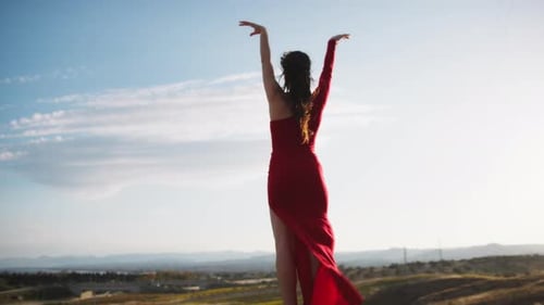 Silhouette Of A Dancing Woman In Red Dress On The Calabrian Hill