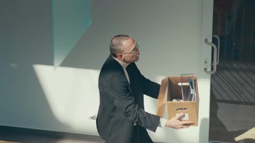 Couple of Dancers Making Performance with Office Box in Hallway