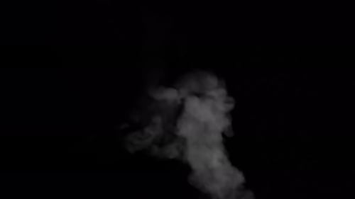 Steam Stream Closeup Isolated On Black Background