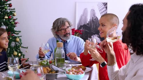 Family and Friends Celebrating Christmas at Home