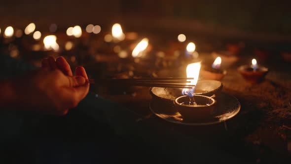 Oil Lamps Flicker in Dim Light at Buddhist Temple Hand Lights Wick ...