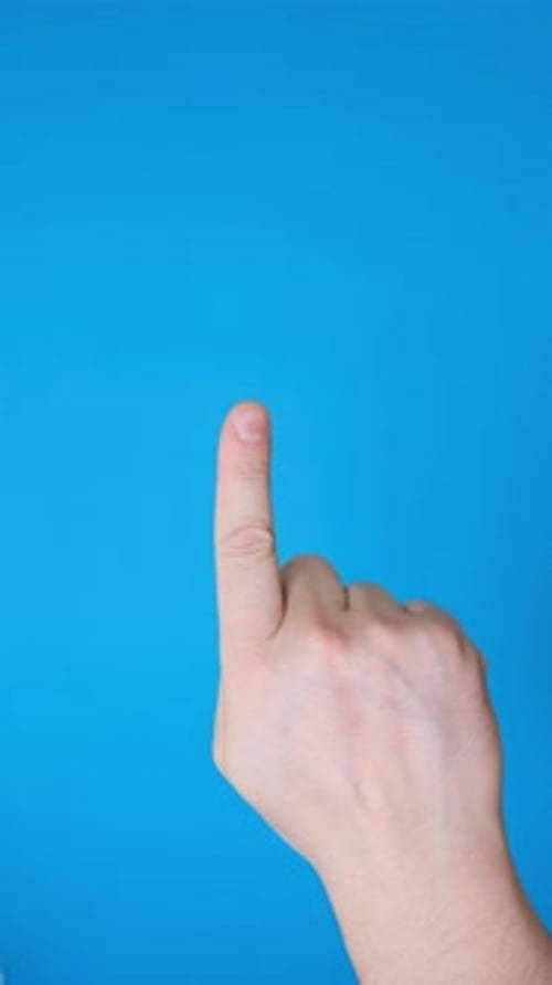 Male Hand Pointing a Finger to the Side Making a Hand Gesture Vertical Video