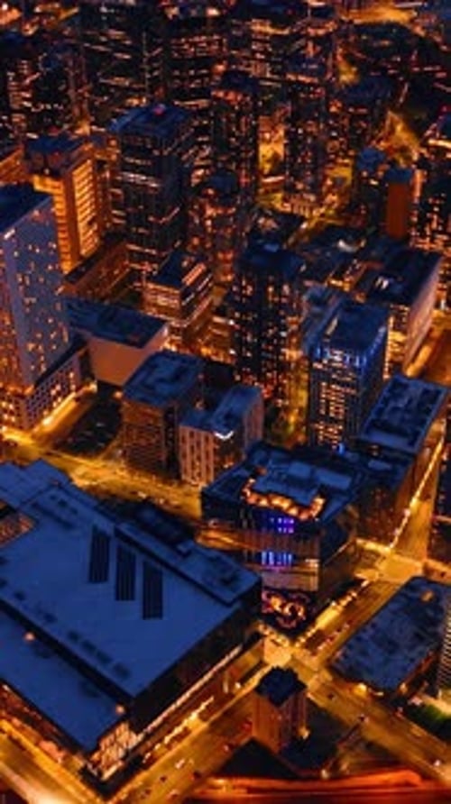 Aerial urban evening. Washington state american city at night. Vertical video