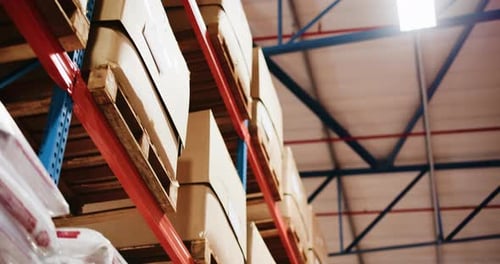 Below, boxes and shelf for logistics in warehouse with supply chain, inventory and distribution