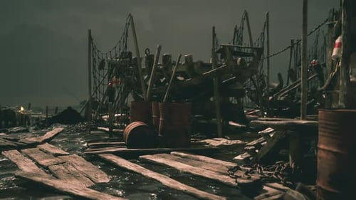 Fishing Dock at Dusk with Wooden Structures and Barrels Reflecting on Water