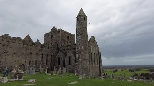 panning left shot of the Rock of Cashel cathedral ruin in County Tipperary Southern Ireland